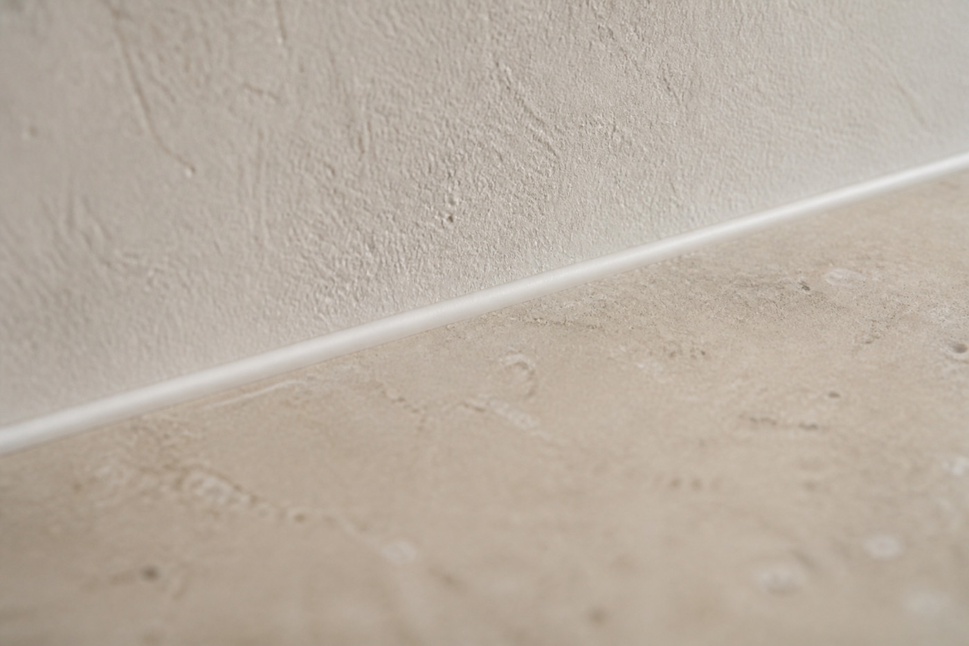 A fresh caulk line along a finished edge